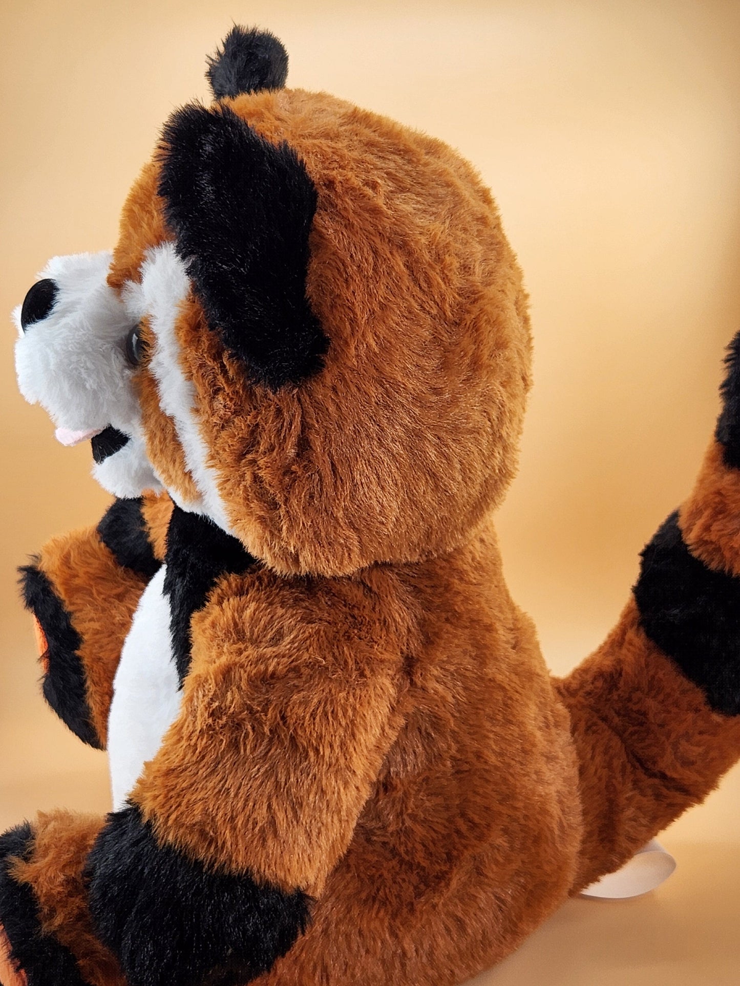 Ruby the Red Panda plush stuffed animal toy side view