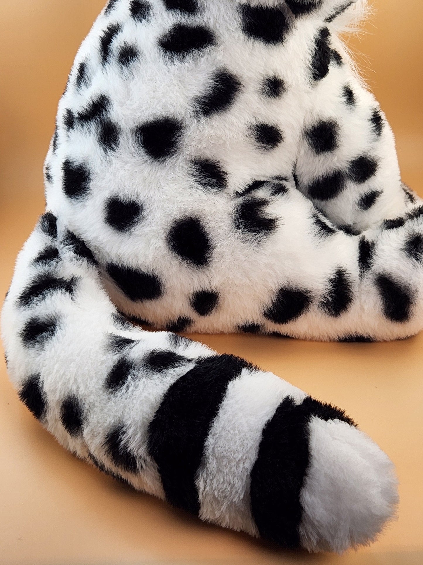 Tashi the Snow Leopard plush stuffed animal toy back view