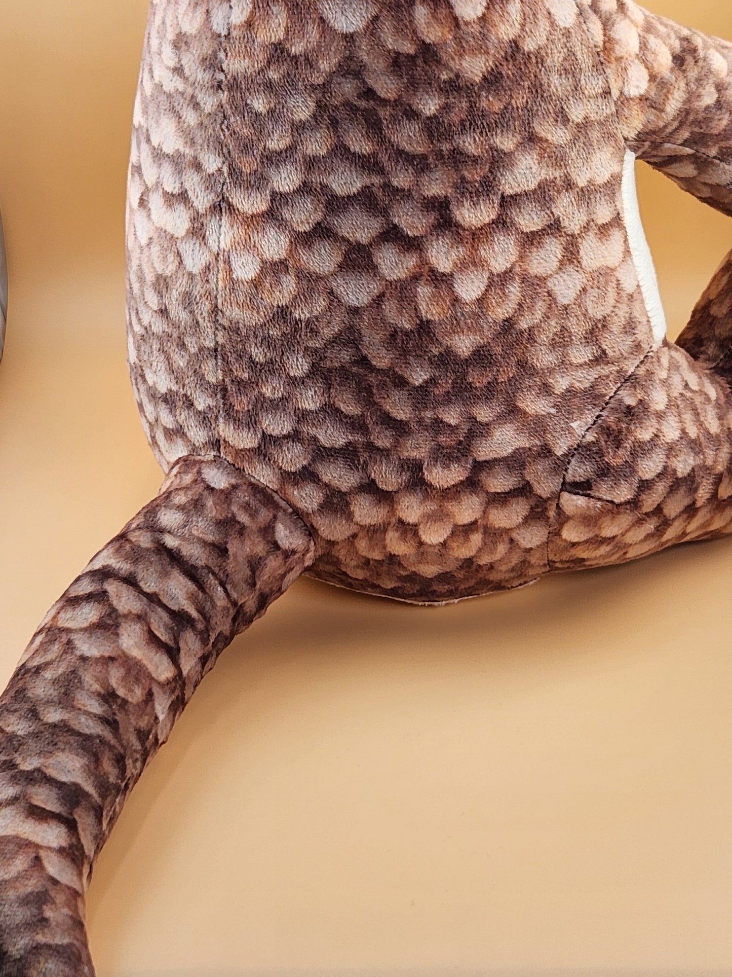 Paulie the Pangolin plush stuffed animal toy back view